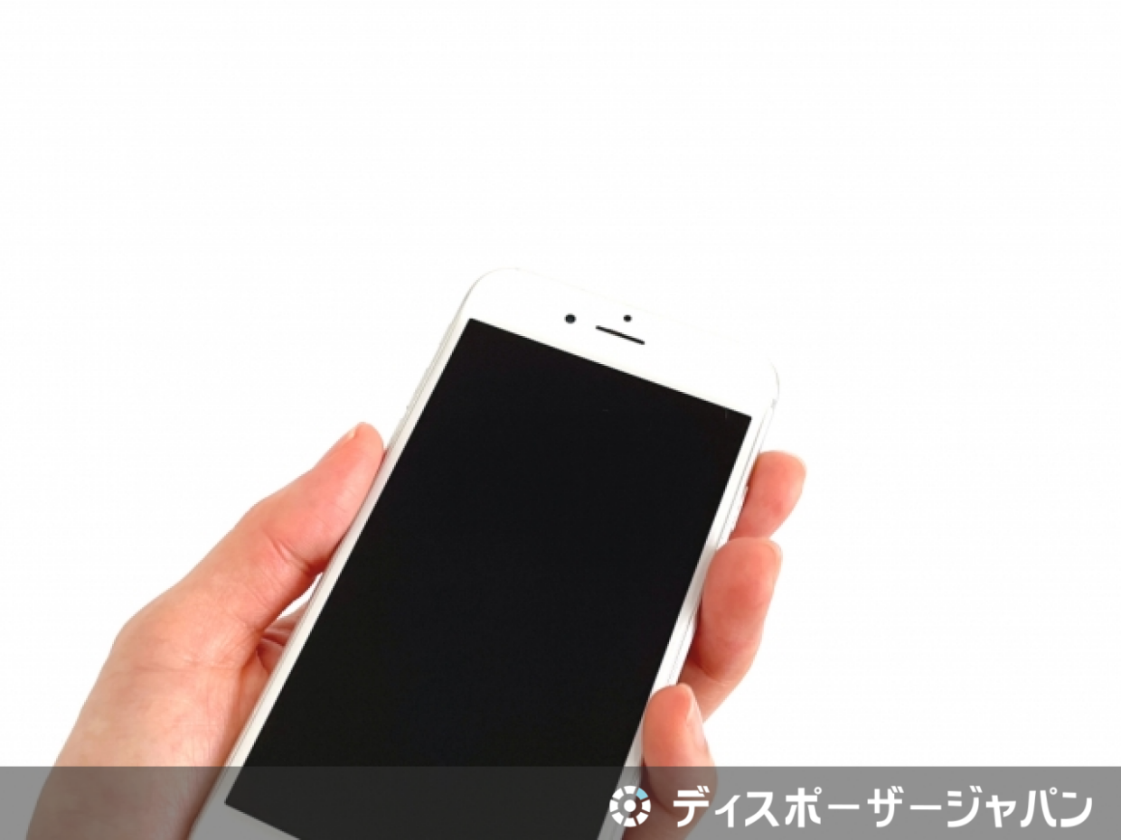 スマートフォンを手に持った画像